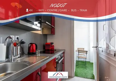Cuisine ou kitchenette dans l'établissement Sweet Home Dijon Nodot