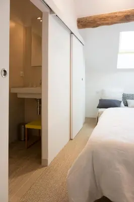 Un ou plusieurs lits dans un hébergement de l'établissement Clos Saint Jacques - Maison d'Hôtes