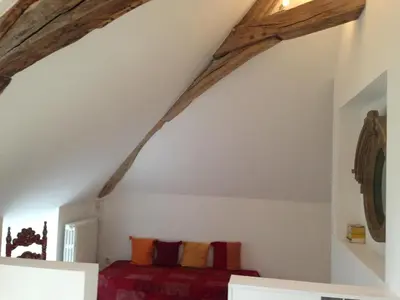 Coin salon dans l'établissement Les Chambres d'Hôtes du Bois Joli