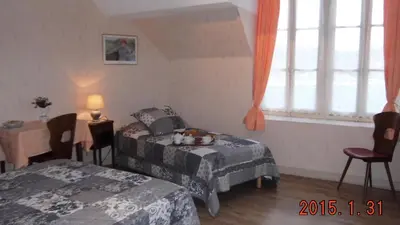 Un ou plusieurs lits dans un hébergement de l'établissement Auberge du Morvan