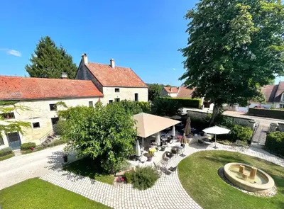Jardin de l'établissement Auberge Côté Rivière