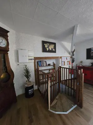 Télévision ou salle de divertissement dans l'établissement Gîte 3 du Château de Feschaux
