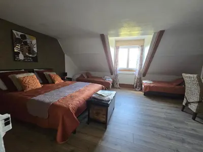 Un ou plusieurs lits dans un hébergement de l'établissement Gîte 3 du Château de Feschaux