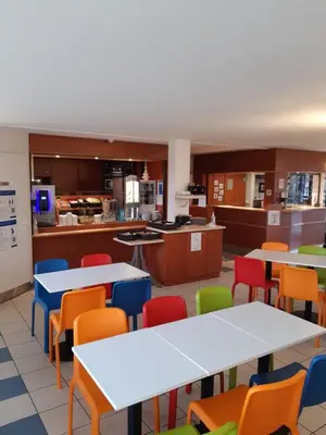 Restaurant ou autre lieu de restauration dans l'établissement ibis budget Nuits Saint Georges