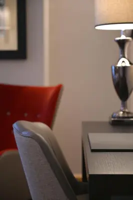 Coin salon dans l'établissement Hôtel Le Rempart