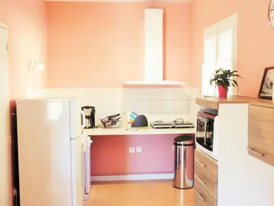 Cuisine ou kitchenette dans l'établissement Les Gîtes de La Fontaine