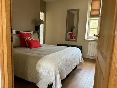 Un ou plusieurs lits dans un hébergement de l'établissement La Maison des Belles Filles