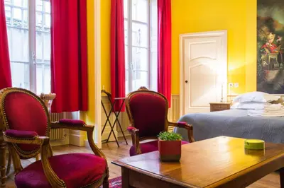 Un ou plusieurs lits dans un hébergement de l'établissement Appartement Le Buffon