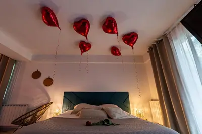 Un ou plusieurs lits dans un hébergement de l'établissement Suite and Spa 21