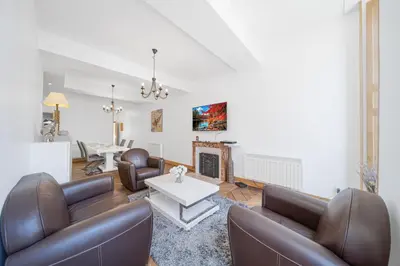 Coin salon dans l'établissement Le Home Carnot