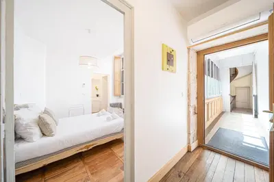 Un ou plusieurs lits dans un hébergement de l'établissement Le Home Carnot