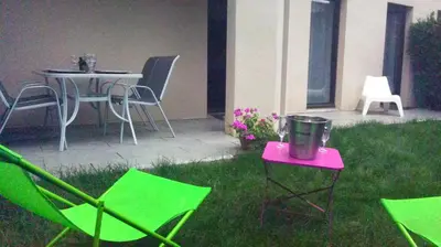 Jardin de l'établissement Appartement Le Louvre