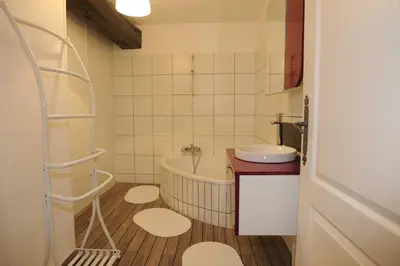 Salle de bains dans l'établissement Appartement La Poulotte