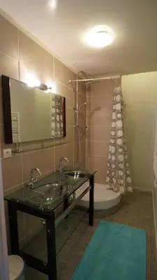 Salle de bains dans l'établissement Le Vinéa