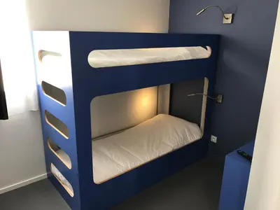 Un ou plusieurs lits dans un hébergement de l'établissement Coto Hotel
