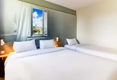 Un ou plusieurs lits dans un hébergement de l'établissement B&B HOTEL Beaune Sud 1 Palais des Congrès