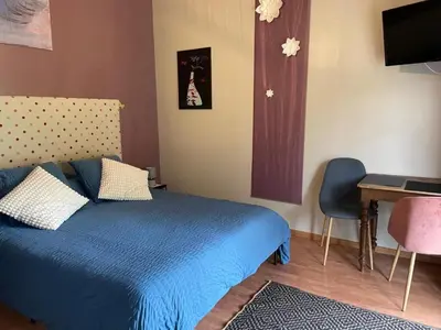Un ou plusieurs lits dans un hébergement de l'établissement Gîte et Studios Les Barongères