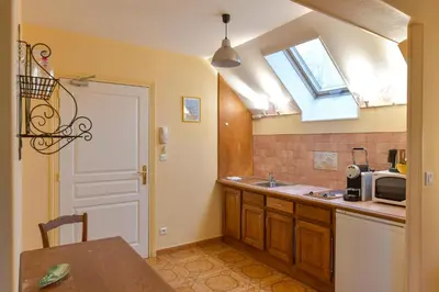 Cuisine ou kitchenette dans l'établissement Gite du Clos Champagnac