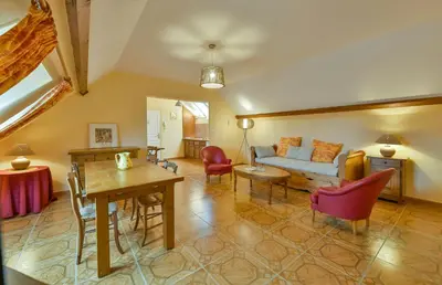 Coin salon dans l'établissement Gite du Clos Champagnac