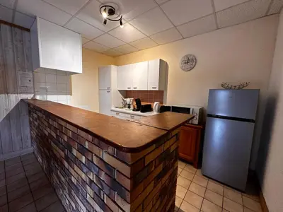 Cuisine ou kitchenette dans l'établissement gîtes des planchettes