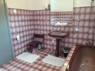 Salle de bains dans l'établissement Les Buissonnets