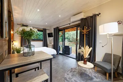 Un ou plusieurs lits dans un hébergement de l'établissement Pied à Terre - Appart'hôtels au coeur d'Autun