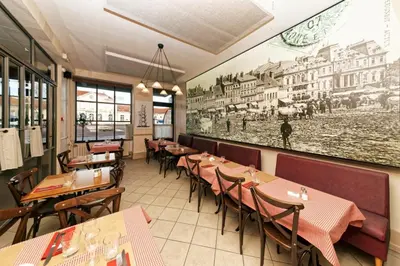 Restaurant ou autre lieu de restauration dans l'établissement Pied à Terre - Appart'hôtels au coeur d'Autun