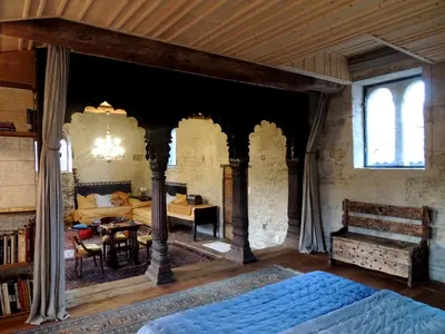 Un ou plusieurs lits dans un hébergement de l'établissement Maison Romane 1136