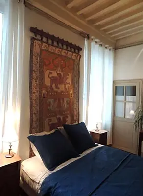 Un ou plusieurs lits dans un hébergement de l'établissement Maison Romane 1136