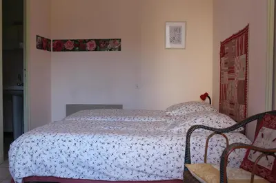 Un ou plusieurs lits dans un hébergement de l'établissement Appartement Val de Saône