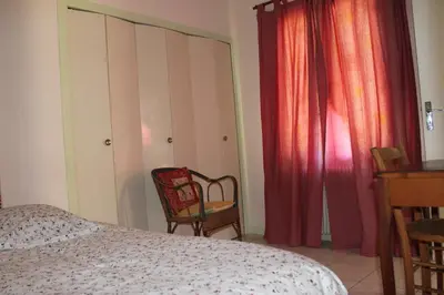 Un ou plusieurs lits dans un hébergement de l'établissement Appartement Val de Saône