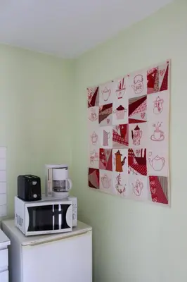 Cuisine ou kitchenette dans l'établissement Appartement Val de Saône