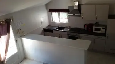 Cuisine ou kitchenette dans l'établissement Gîte de la Forêt