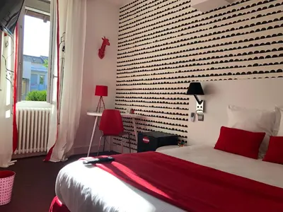 Un ou plusieurs lits dans un hébergement de l'établissement Hôtel Concorde