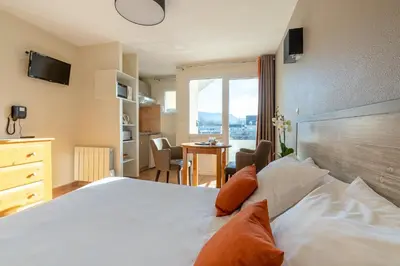 Un ou plusieurs lits dans un hébergement de l'établissement Residence Des Thermes