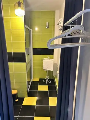 Salle de bains dans l'établissement Le D'Tour Gourmand