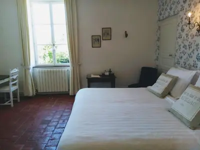 Un ou plusieurs lits dans un hébergement de l'établissement Château Latour