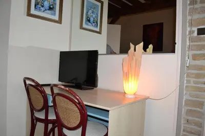 Télévision ou salle de divertissement dans l'établissement Lud'Hôtel