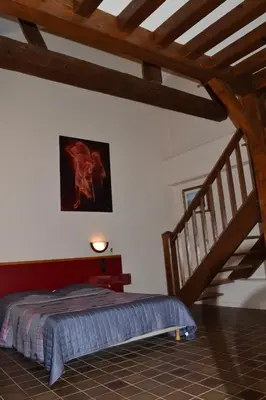 Un ou plusieurs lits dans un hébergement de l'établissement Lud'Hôtel