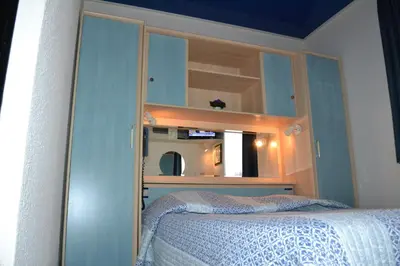 Un ou plusieurs lits dans un hébergement de l'établissement Lud'Hôtel