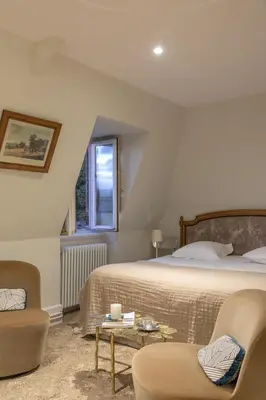 Un ou plusieurs lits dans un hébergement de l'établissement Château de Saulon
