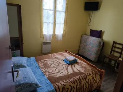 Un ou plusieurs lits dans un hébergement de l'établissement Auberge Du Bon Coin