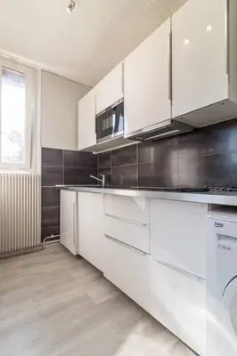 Cuisine ou kitchenette dans l'établissement Appartements Le Cru Colbert