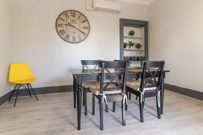 Coin salon dans l'établissement Appartements Le Cru Colbert
