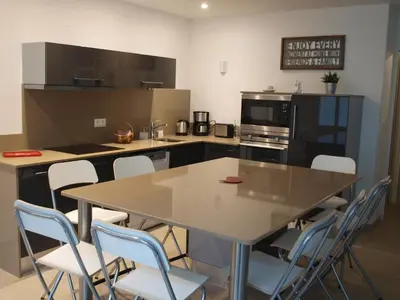 Cuisine ou kitchenette dans l'établissement Cottage nuiton