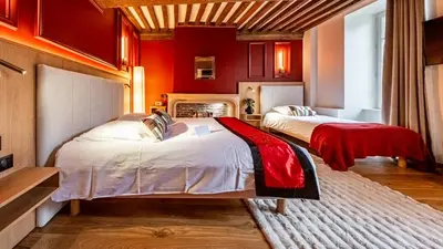 Un ou plusieurs lits dans un hébergement de l'établissement Hotel Relais De La Cote D'or