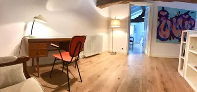 Coin salon dans l'établissement Chambres d'hôtes Vers la Croix