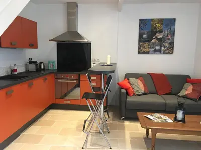 Cuisine ou kitchenette dans l'établissement Au Coeur de Nuits