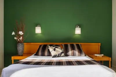 Un ou plusieurs lits dans un hébergement de l'établissement Logis Hôtel Golf Le Domaine Du Val De Sorne