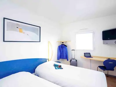 Télévision ou salle de divertissement dans l'établissement ibis Budget Pouilly-en-Auxois